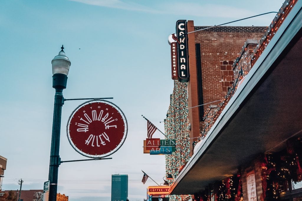 Automobile Alley sign with store fronts in the background in Oklahoma City