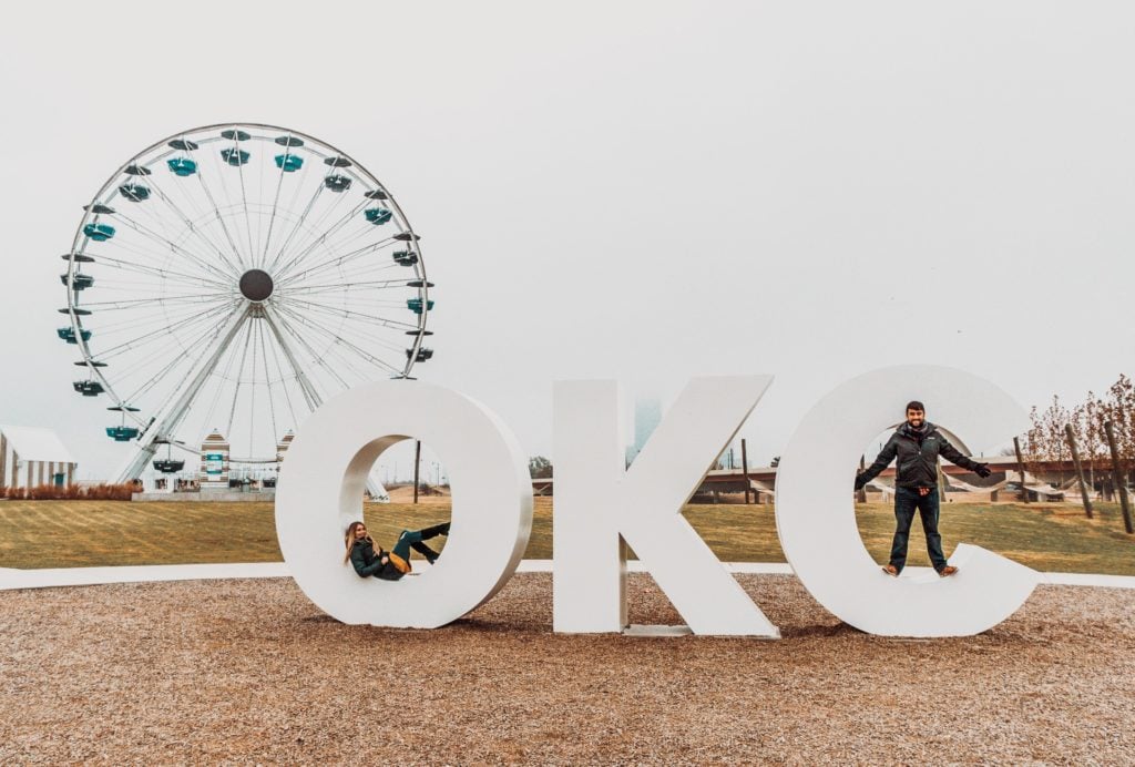 OKC sign in front of Wheeler Ferris Wheel in OKC