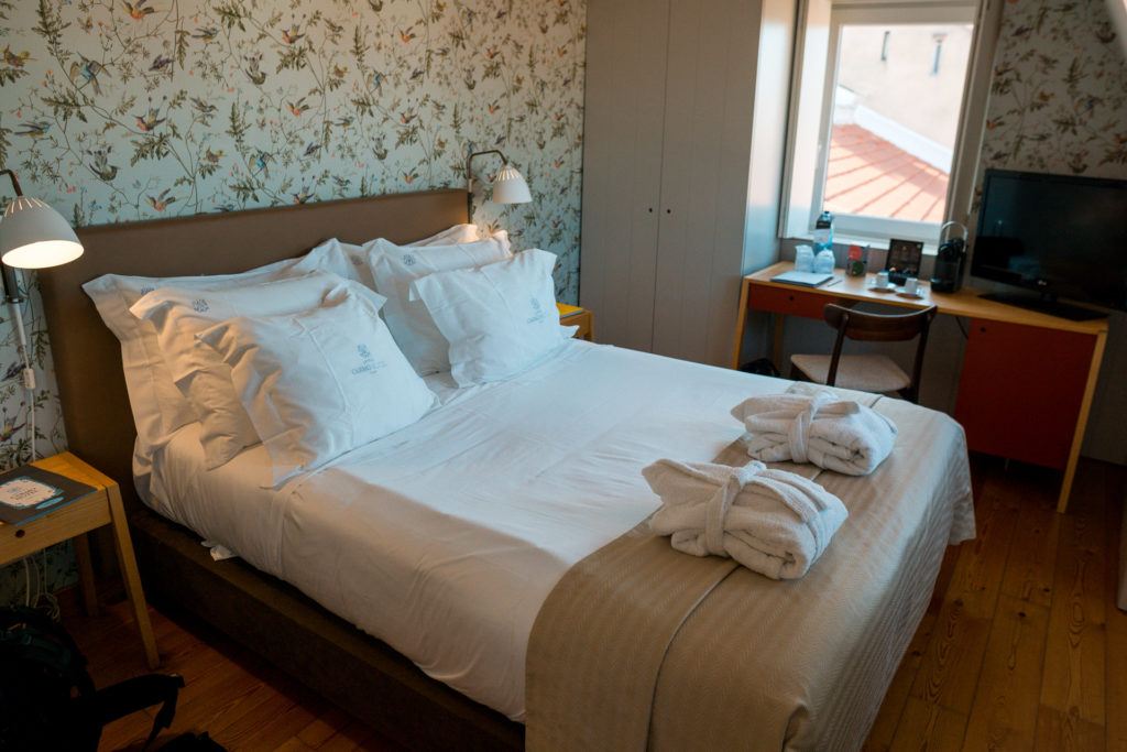Bed at Lisboa Carmo Hotel perfect for a place to stay for your Lisbon itinerary.