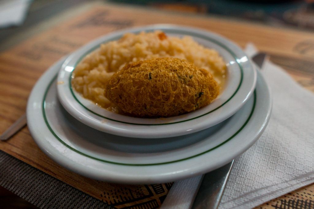 Codfish cake with creamy tomato rice on the Taste of Lisboa food tour