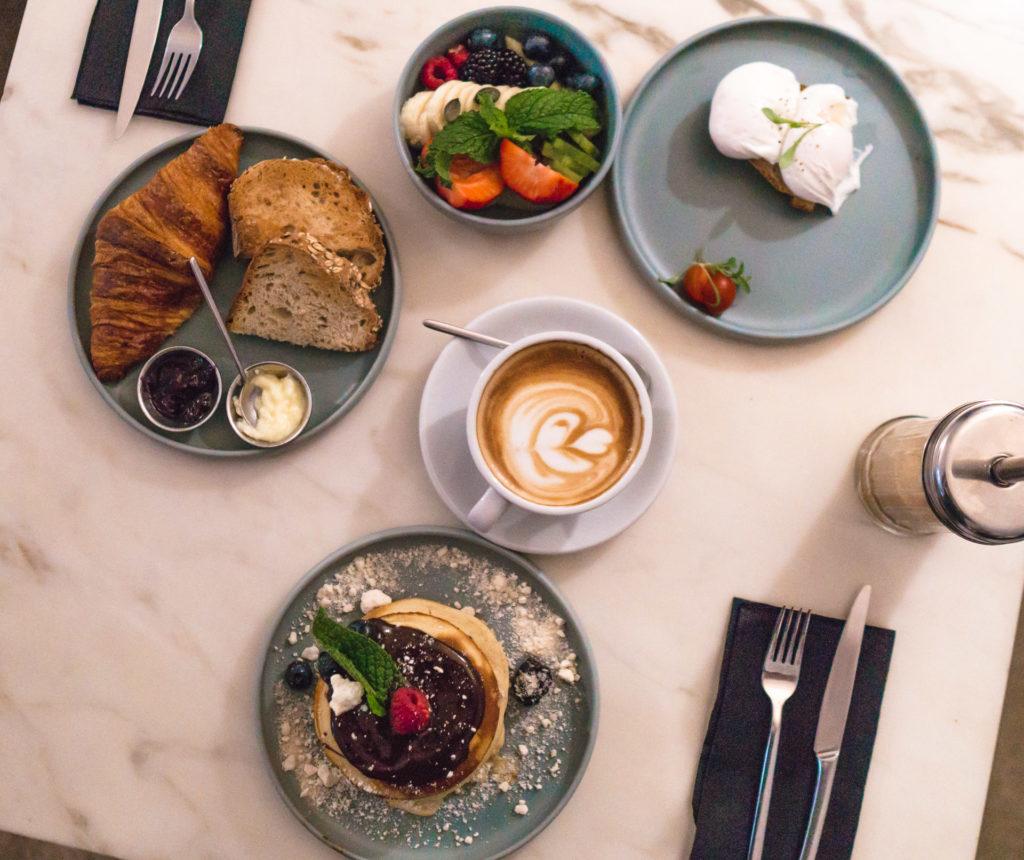 Flatlay shot of breakfast items from Dear Breakfast in Lisbon, Portugal