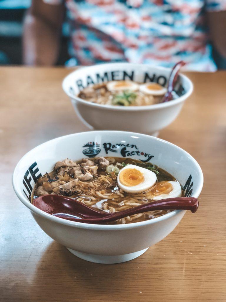 Two bowls of freshly prepared ramen.