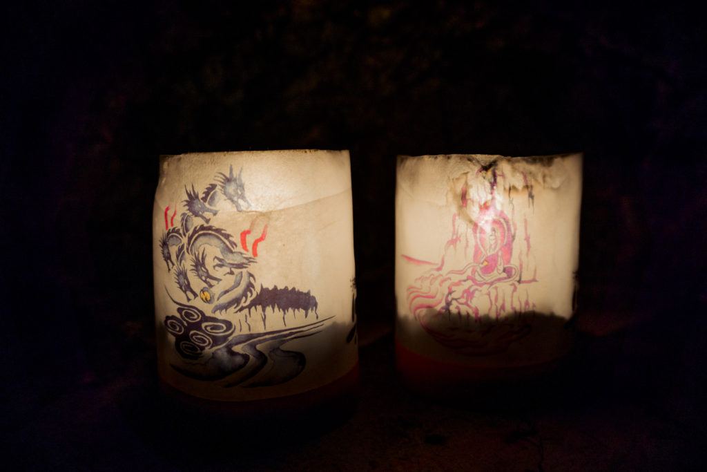 Japanese lanterns in Iwaya Caves.